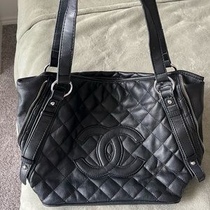 Black quilted tote bag